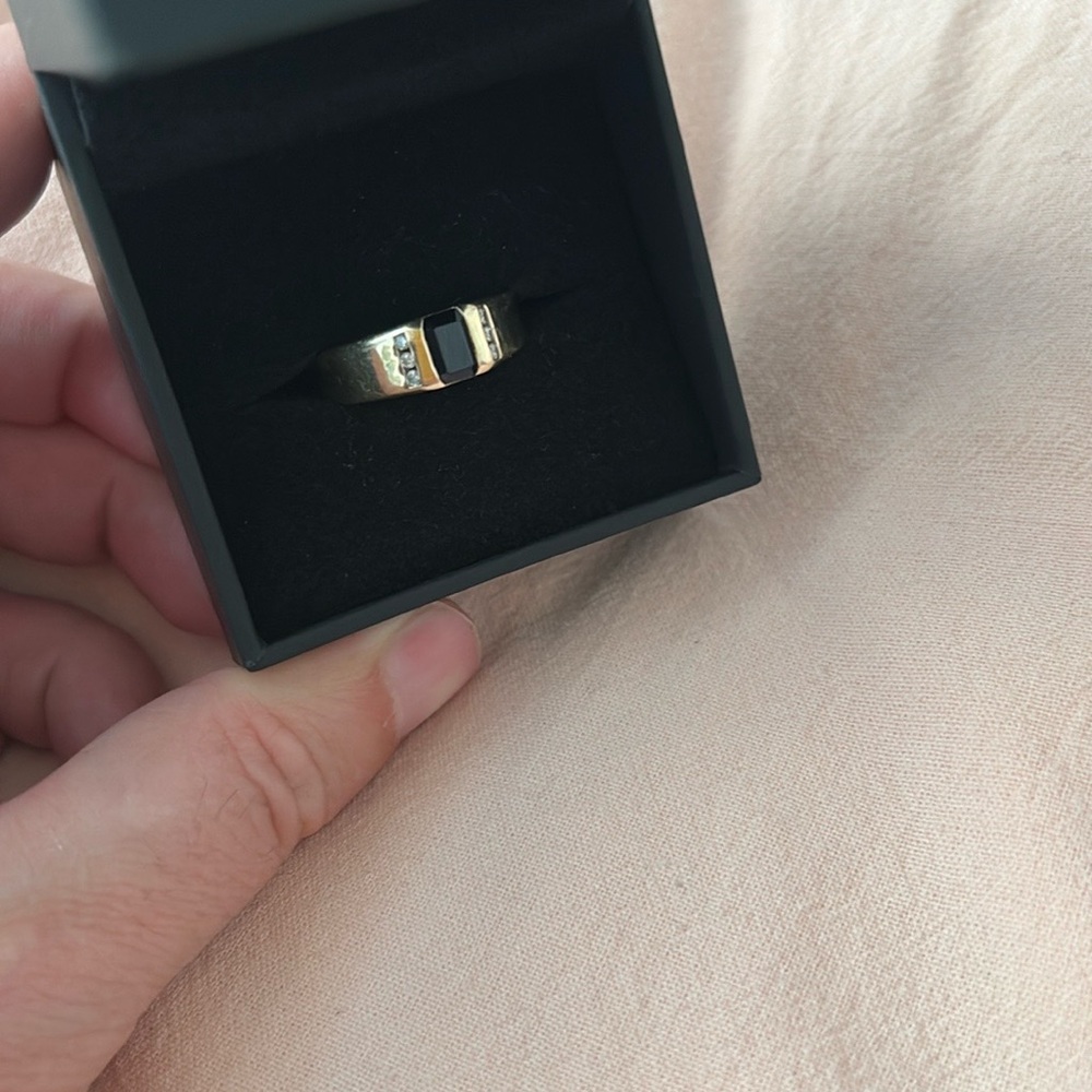 Men’s gold ring with diamonds and sapphire gemstone